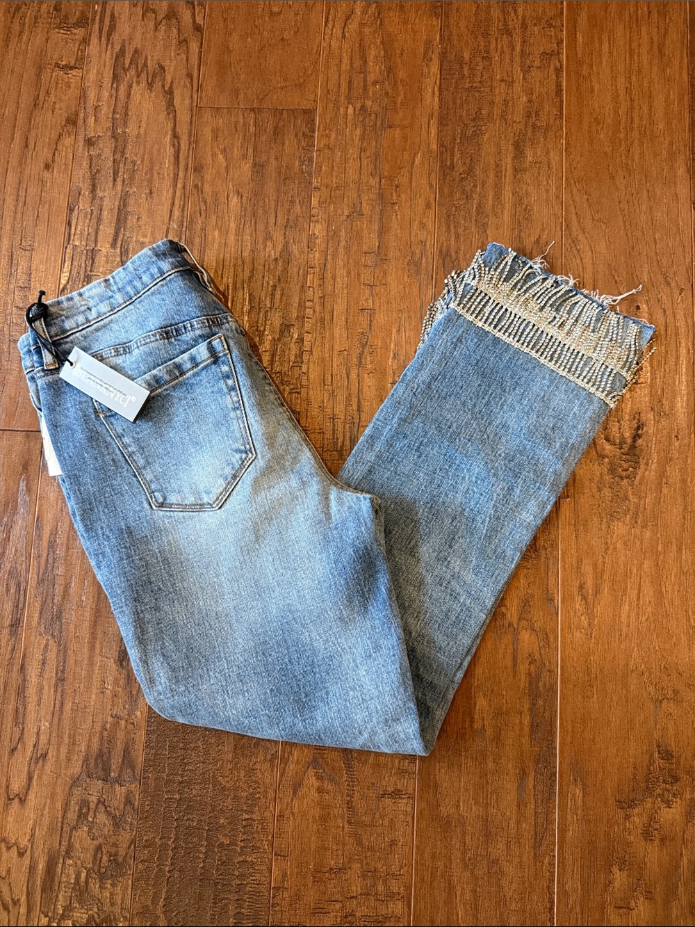 NWT BlankNYC The Madison Crop Distressed Hem Denim Jeans with silver detailing